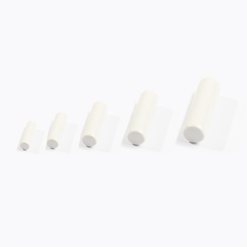 Ceramic components showing different surface finishes under magnification