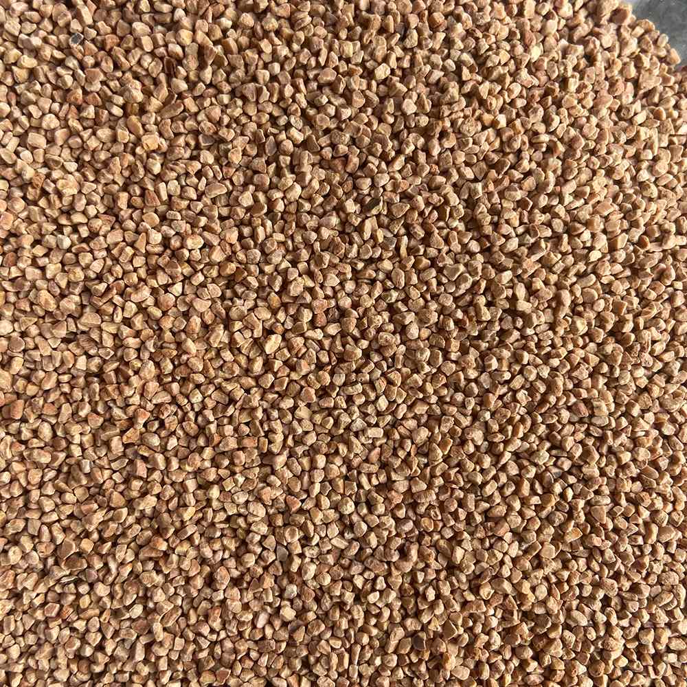 Close-up of crushed walnut shell tumbling media