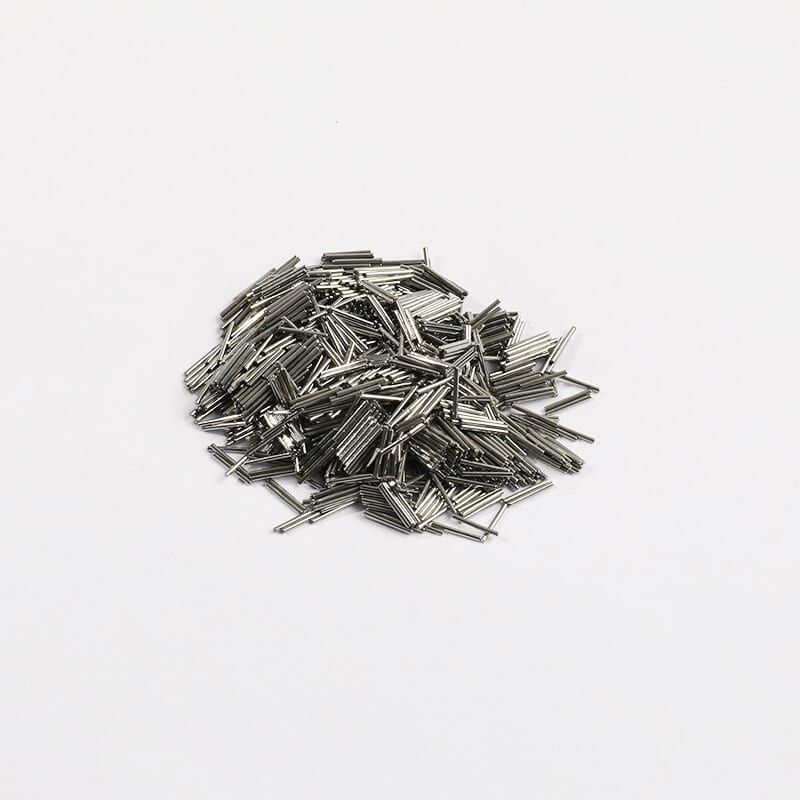 304 stainless steel pin media for magnetic and vibratory finishing on white background