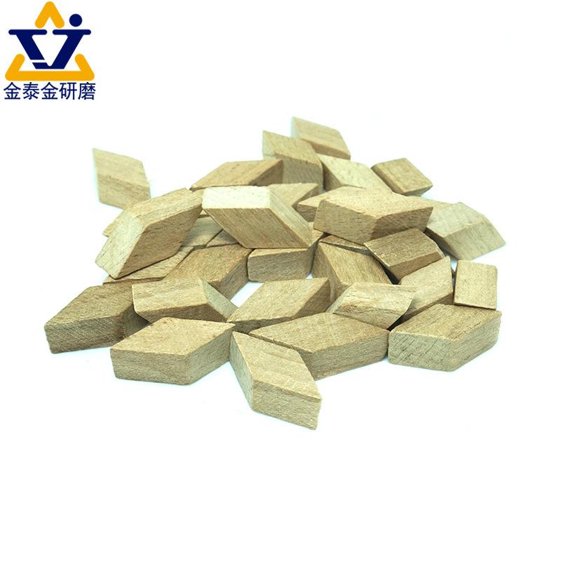Wooden tumbling media pieces for dry finishing